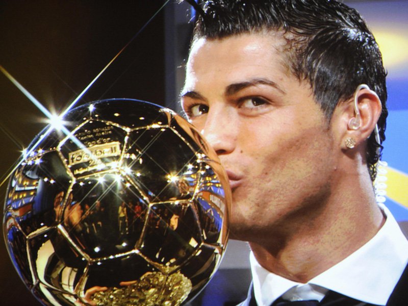 Cristiano Ronaldo kissing BALLON D'OR award